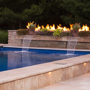 fiberglass swimming pool with fire and waterfall features